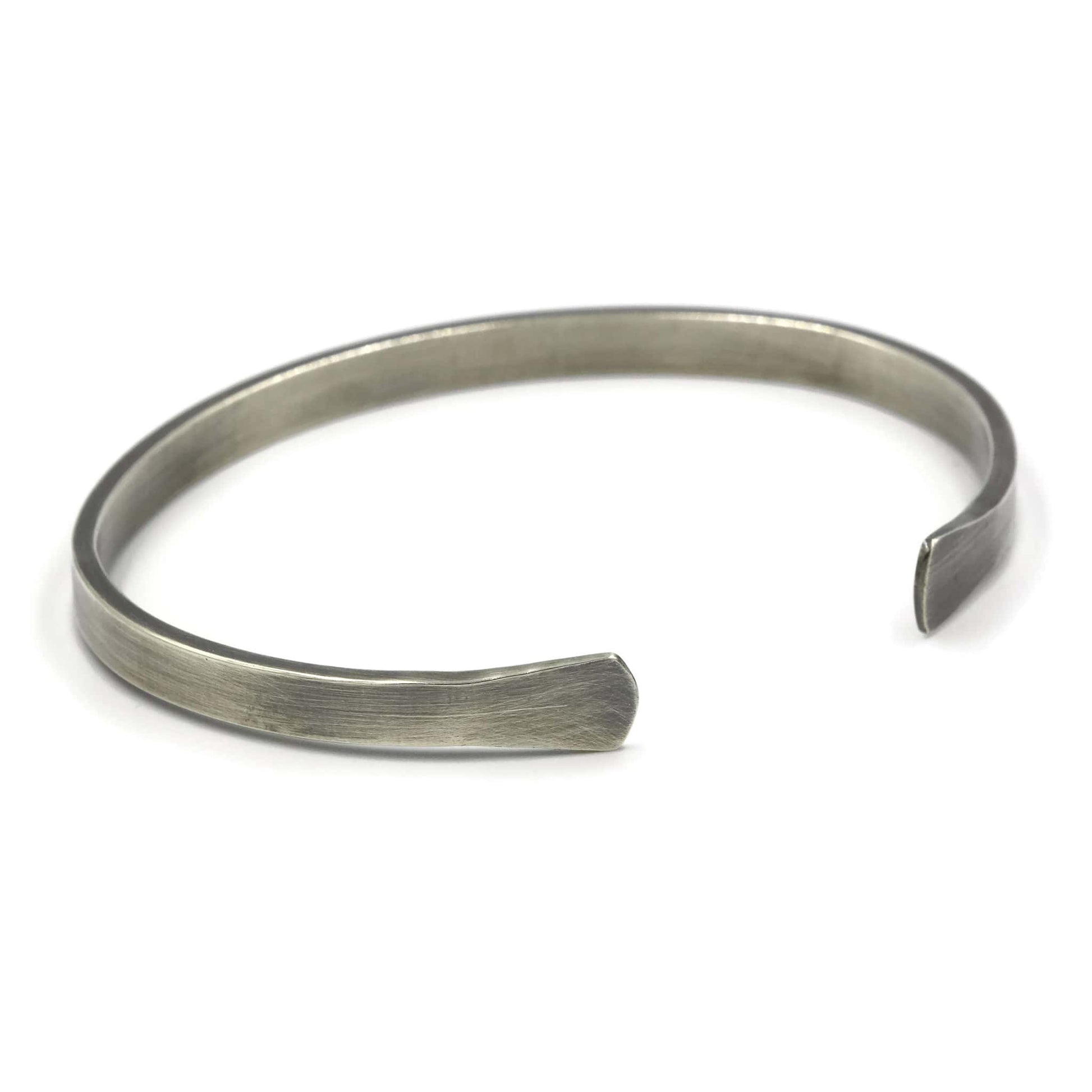Sterling silver men's cuff bracelet with flared ends and oxidised finish - Rebecca Cordingley