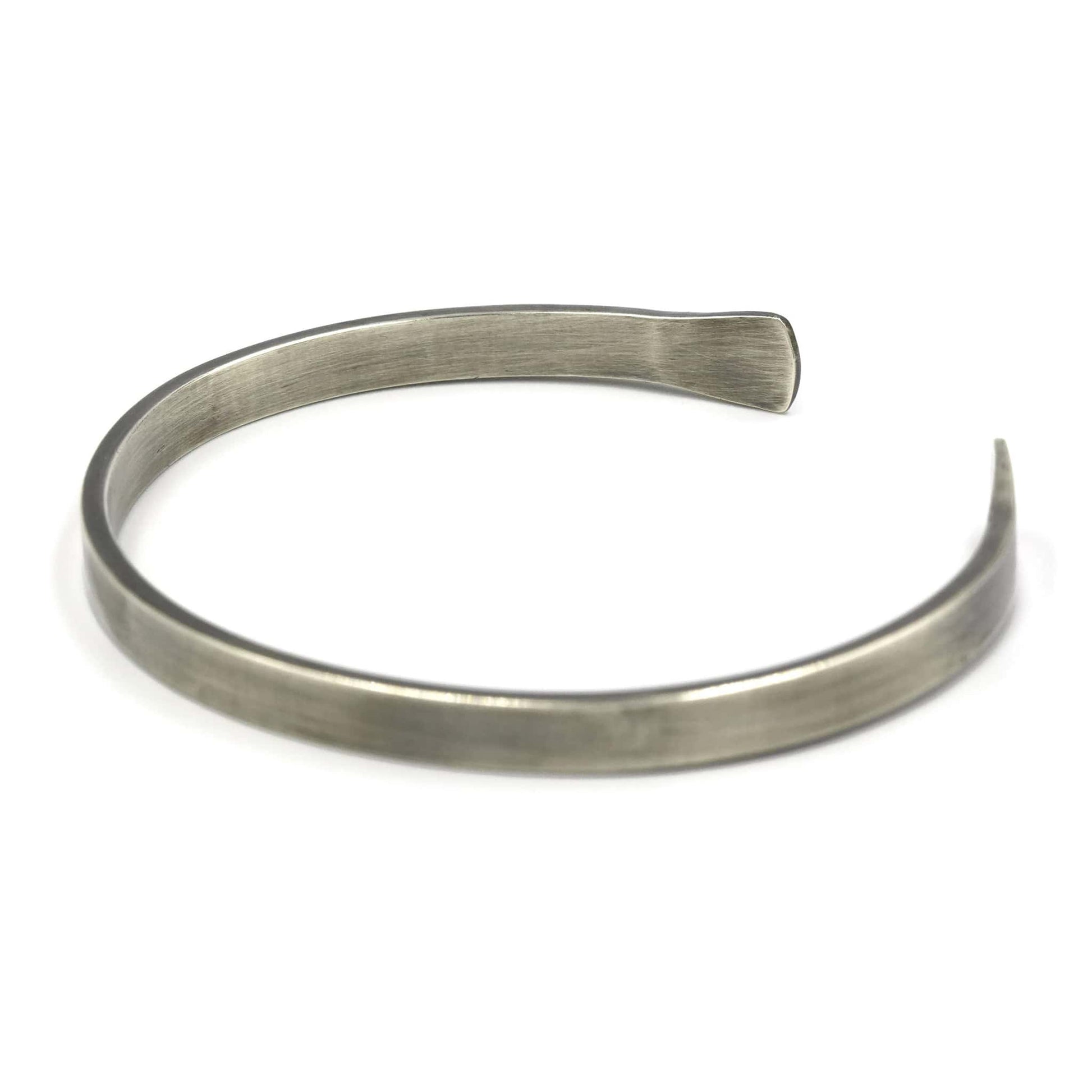 Sterling silver men's cuff bracelet with flared ends and oxidised finish - Rebecca Cordingley