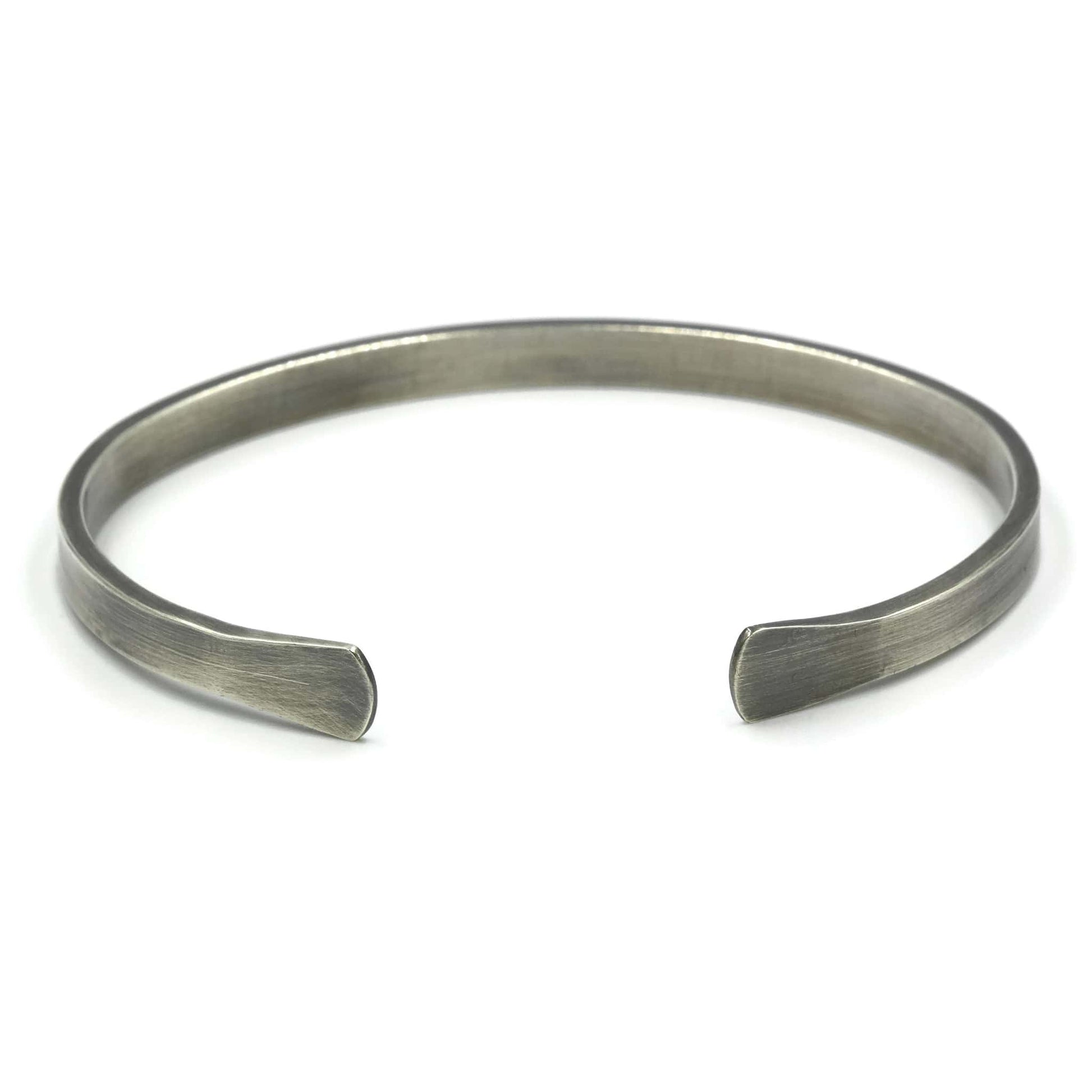 Sterling silver men's cuff bracelet with flared ends and oxidised finish - Rebecca Cordingley