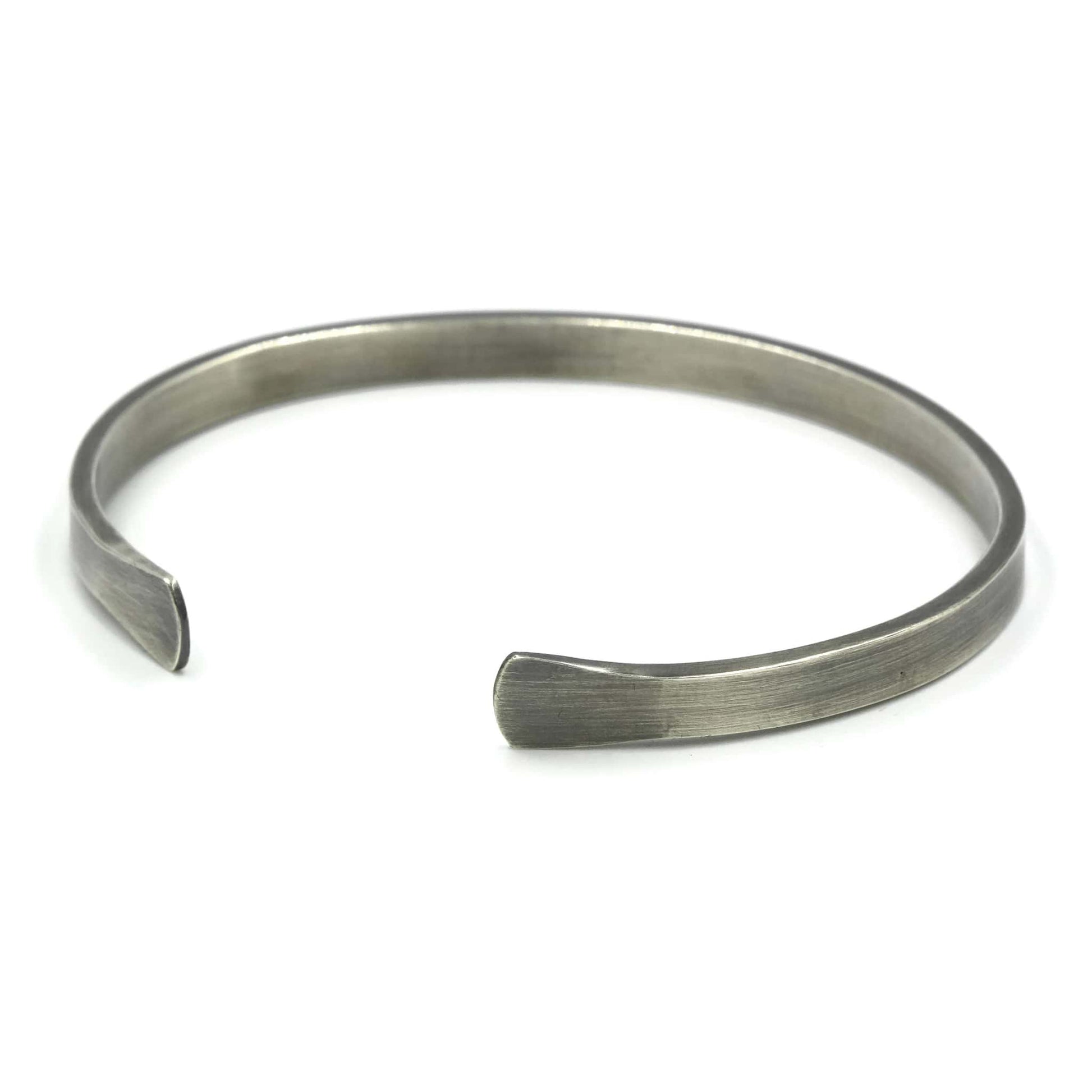 Sterling silver men's cuff bracelet with flared ends and oxidised finish - Rebecca Cordingley