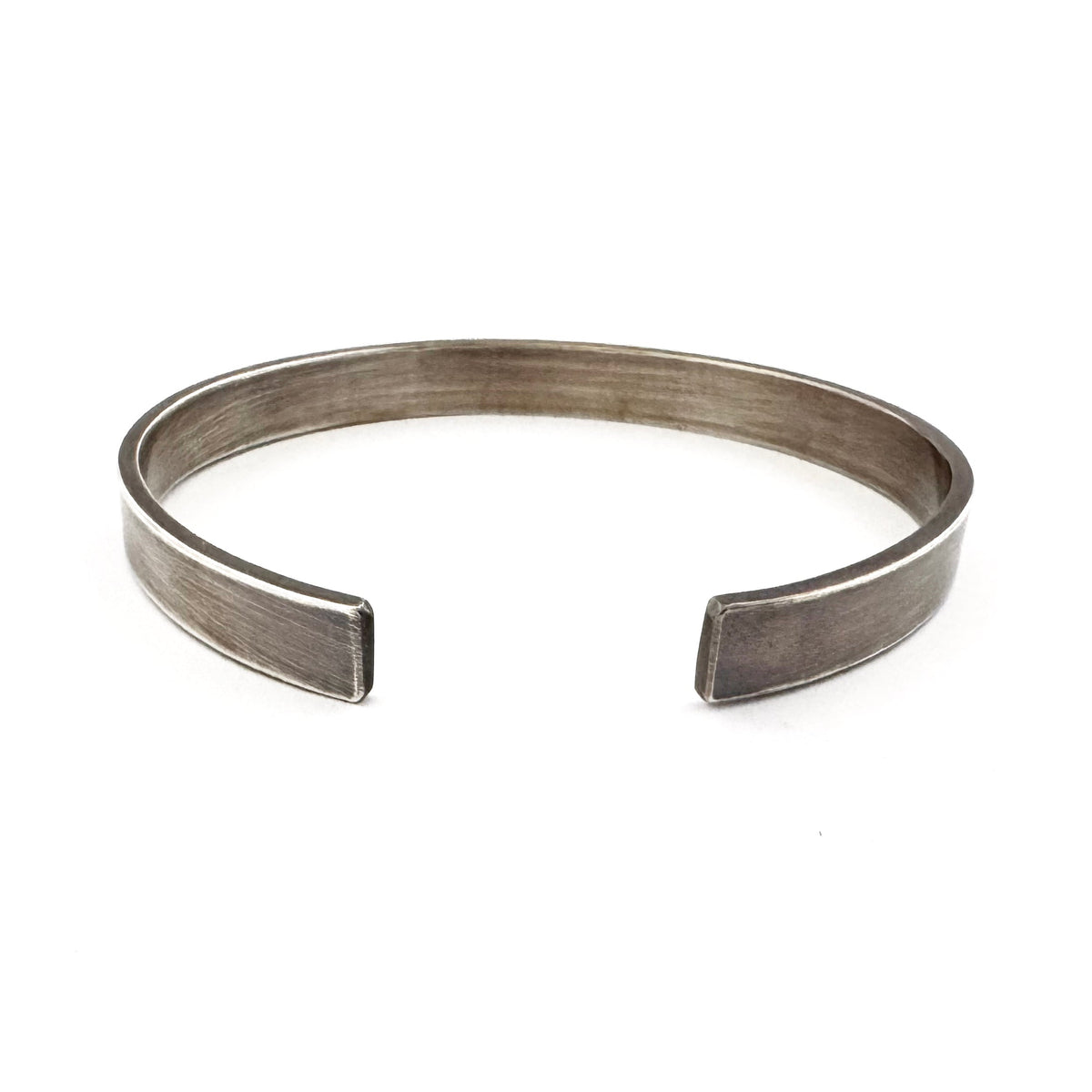 Oxidised sterling silver cuff bracelet showing the open ends and 8mm width