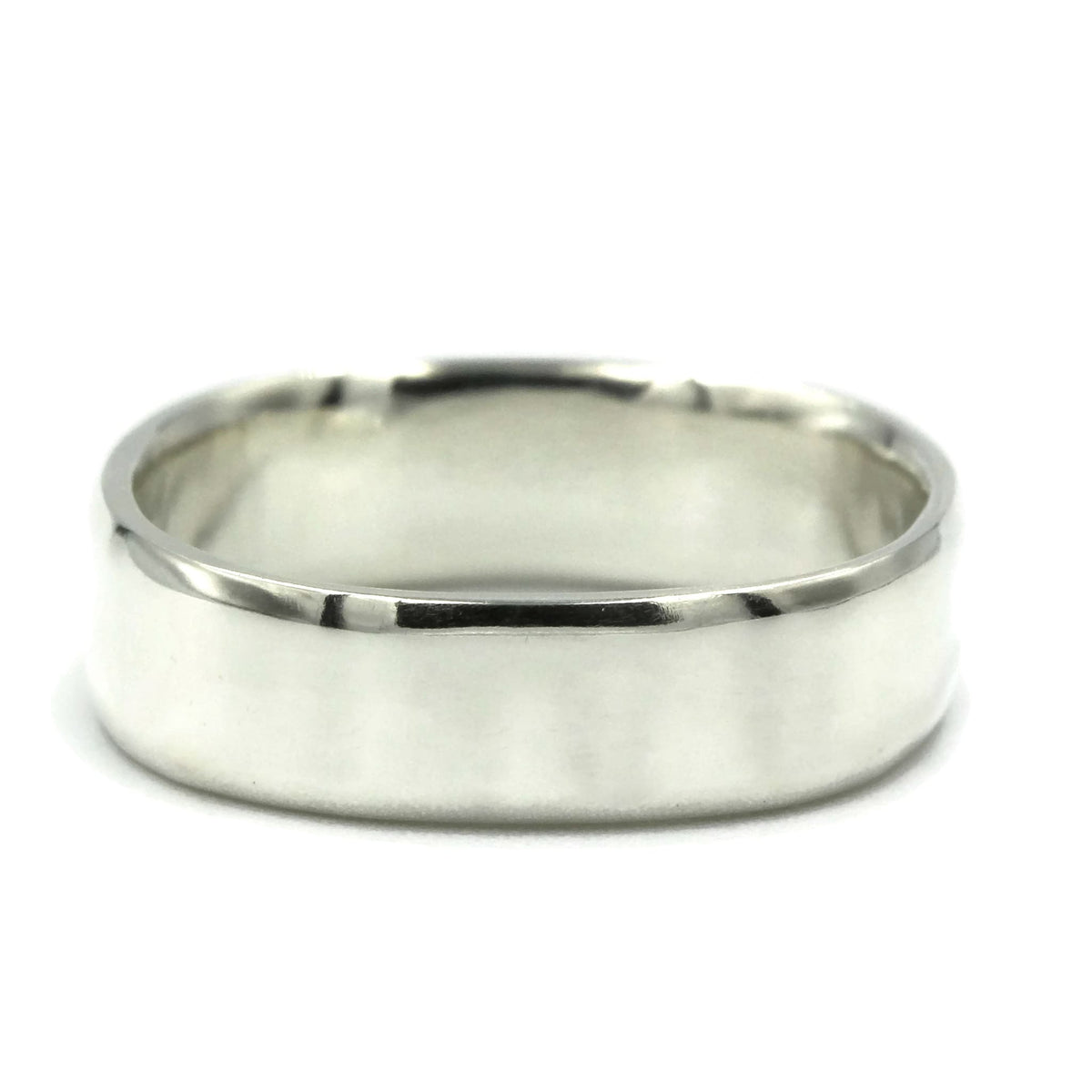 Square sterling silver wedding ring with bevelled edges, laying flat on white background, handmade in Australia