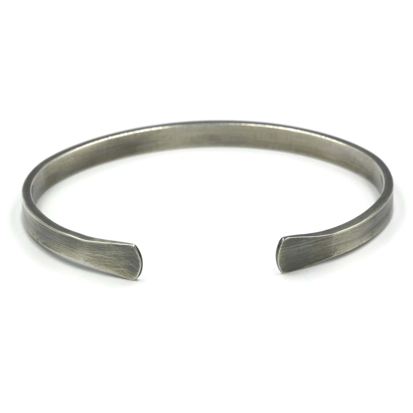 Sterling silver cuff bracelet with flared ends and oxidised finish - Rebecca Cordingley